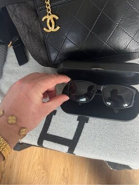 CHANEL Black Sunglasses with Gold Logo Accent